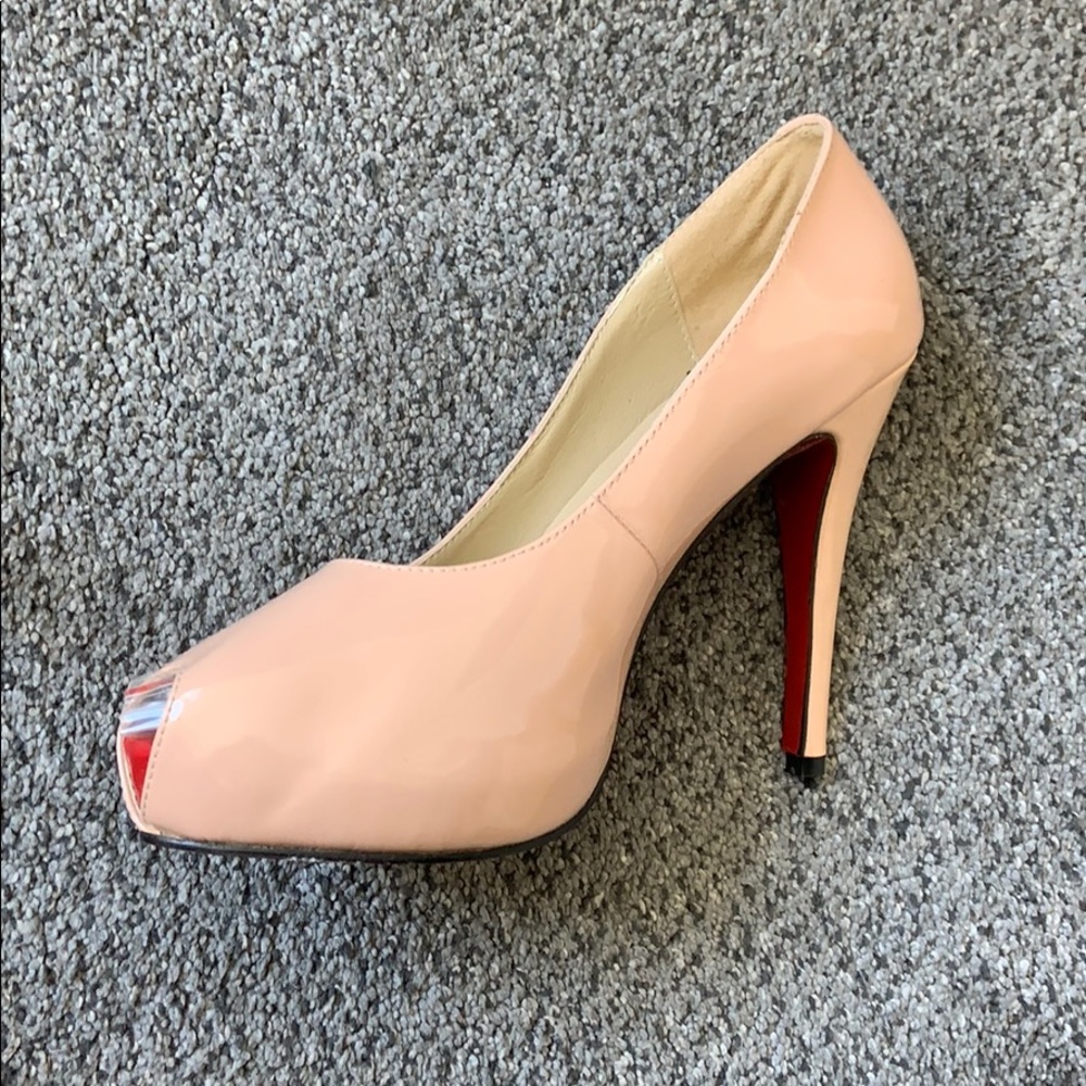 Christian Lounoutin patent leather pumps